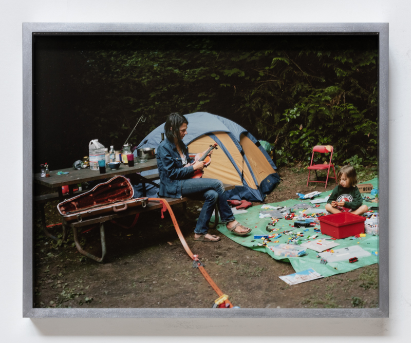 Justine Kurland. Violin and Legos, 2010, pigment print, 13 x 10 3/8 inches // Burlington Northern on the North Shore of the Columbia, 2008, pigment print, 8 1/8 x 10 inches, printed 2023, mounted on aluminum, 13 x 10 3/8 inches, edition of 6
